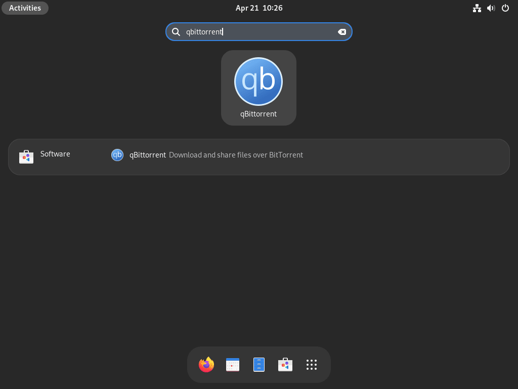Screenshot showing the launch of qBittorrent desktop client from the Fedora Linux applications menu.