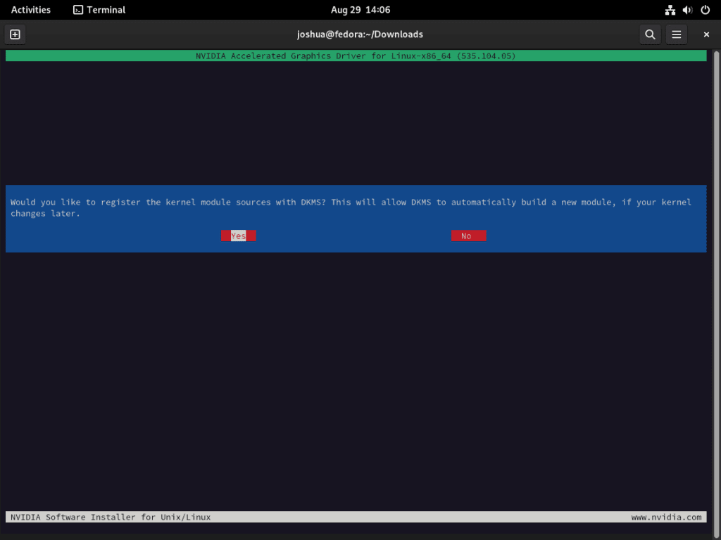 Screenshot of selecting 'Yes' to register NVIDIA kernel modules with DKMS on Fedora Linux