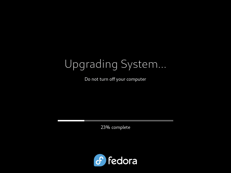 Screenshot displaying the reboot and upgrade process transitioning to Fedora 39.